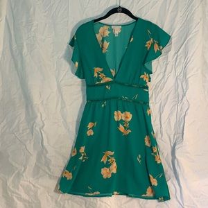 Green dress with orange flowers
